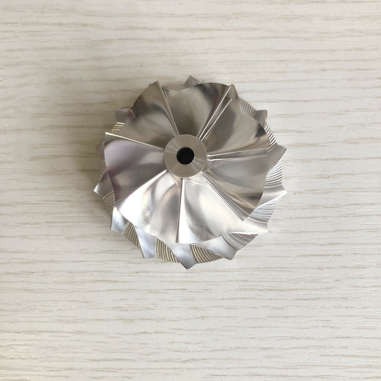 GT15-25 49.15/63.00 mm 7+7 Blade High-Performance Turbine Billet Compressor Wheel