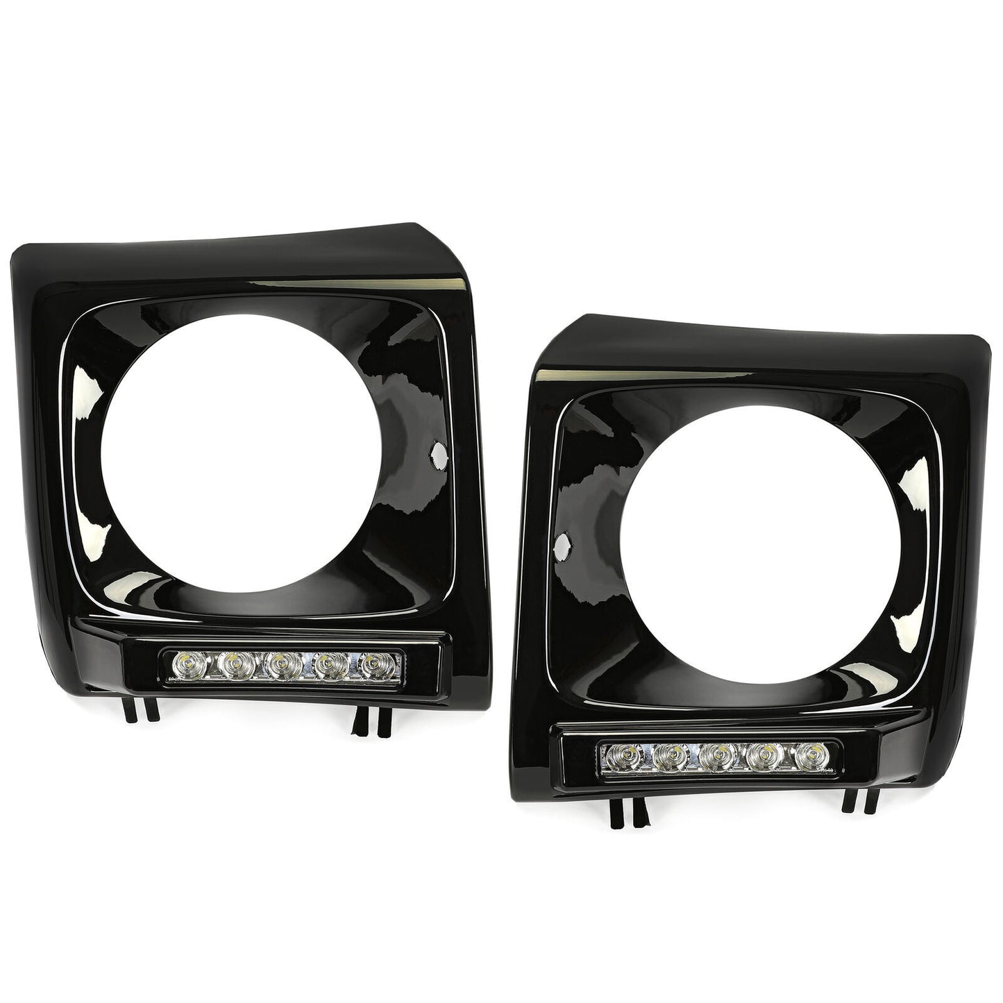 pair of black headlight bezels for the 1990-2018 for Mercedes W463 G63 Wagon G500 with LED DRLs.
