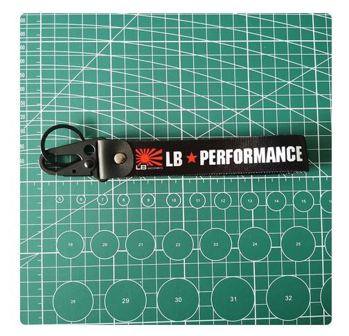 1 car key ring/key chain with lanyard, black, suitable for Mitsubishi .