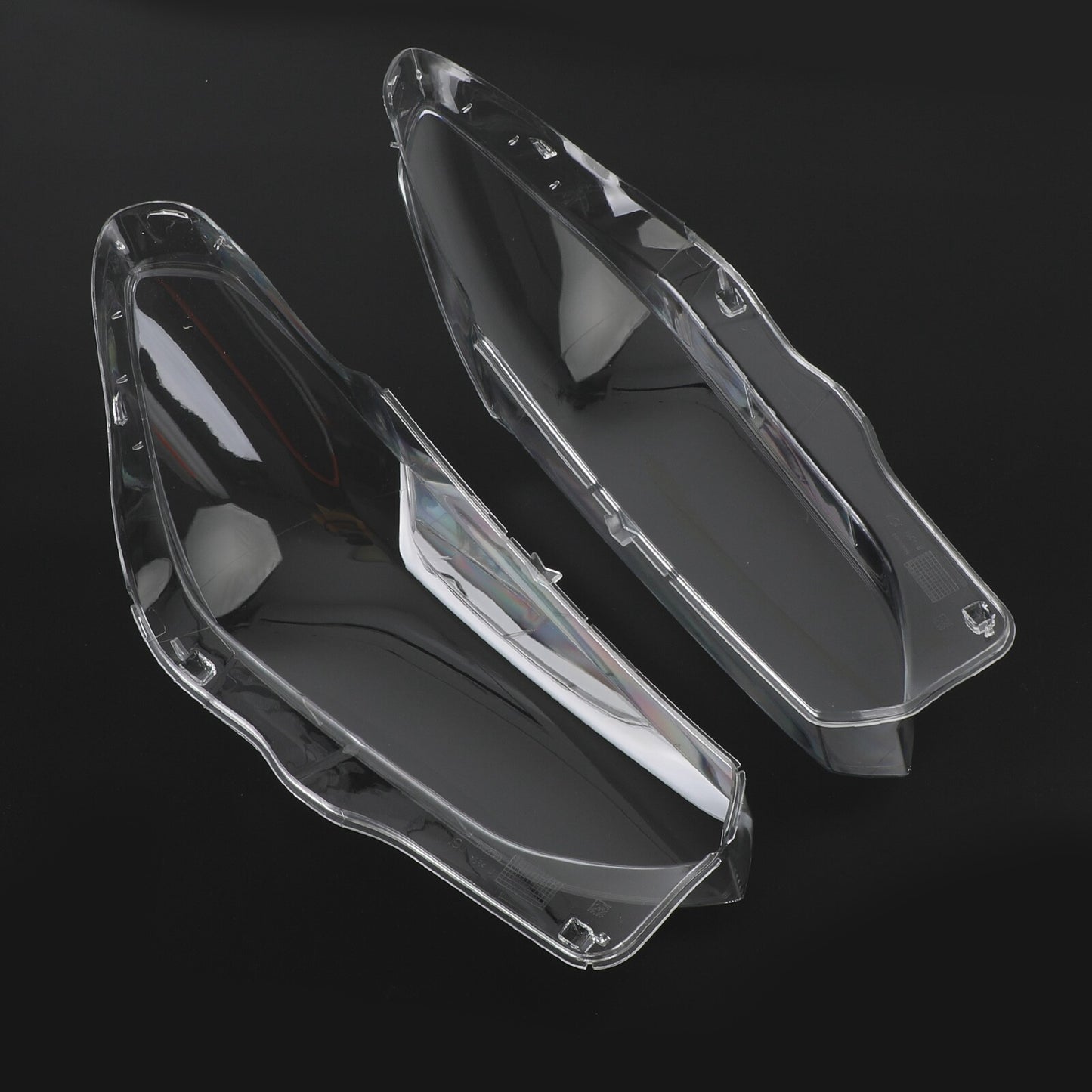 A pair of transparent headlight lens replacement covers for BMW X3 X4 G01 G02 G08 2018-2021