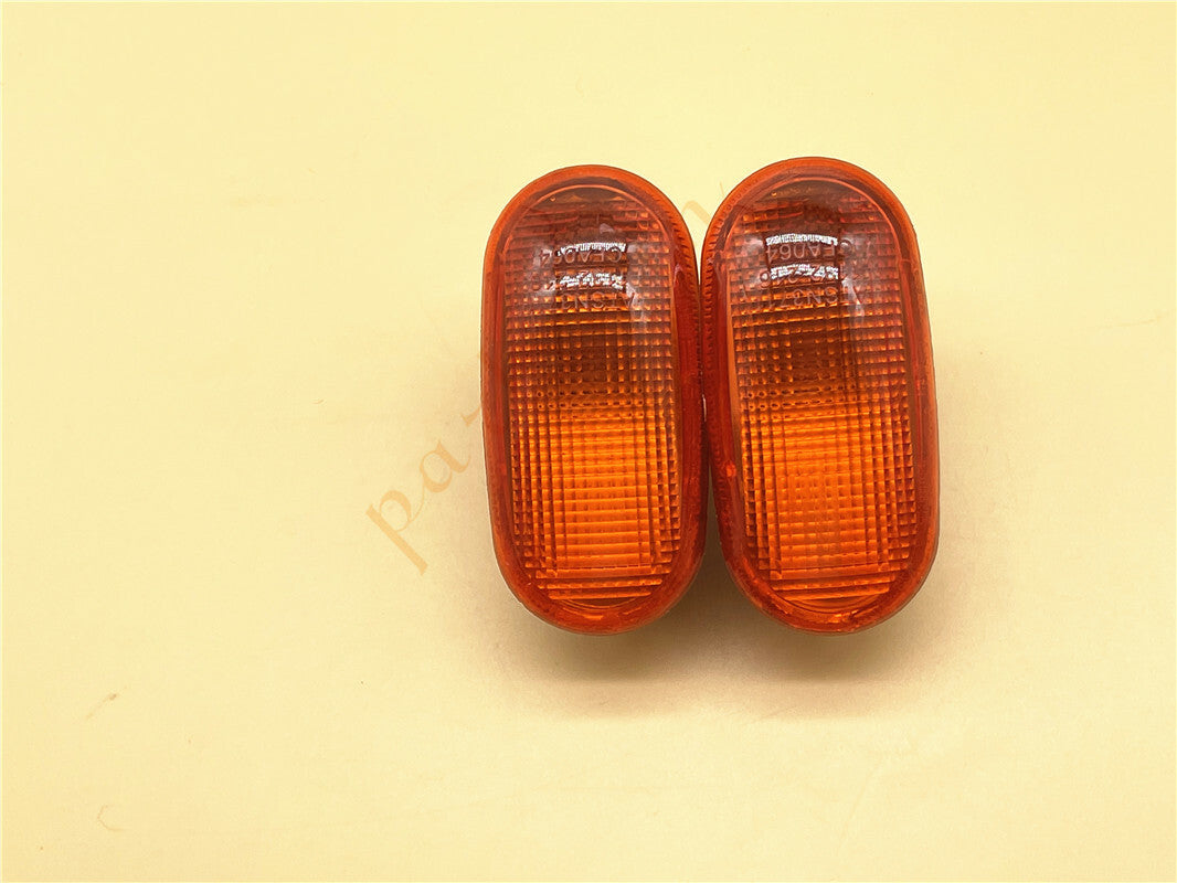 A pair of amber parking lights and bulbs suitable for Mitsubishi Mirage 1992-2000