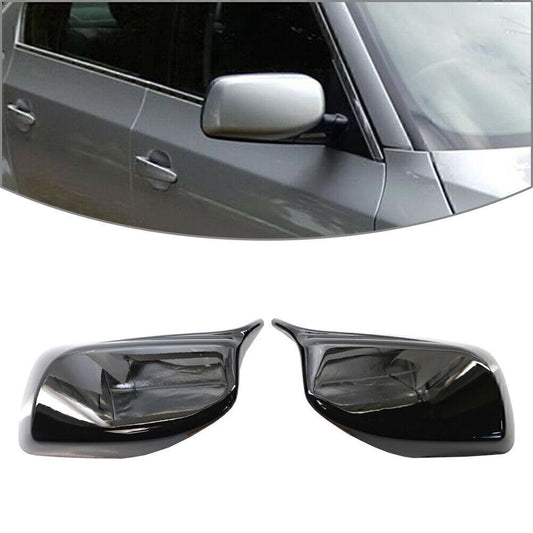 A pair of rearview mirror cover trims for BMW E60/E61 2004-2007 models, no removal tools required.